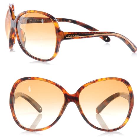 butterfly sunglasses prada|Prada blue tortoise shell sunglasses.